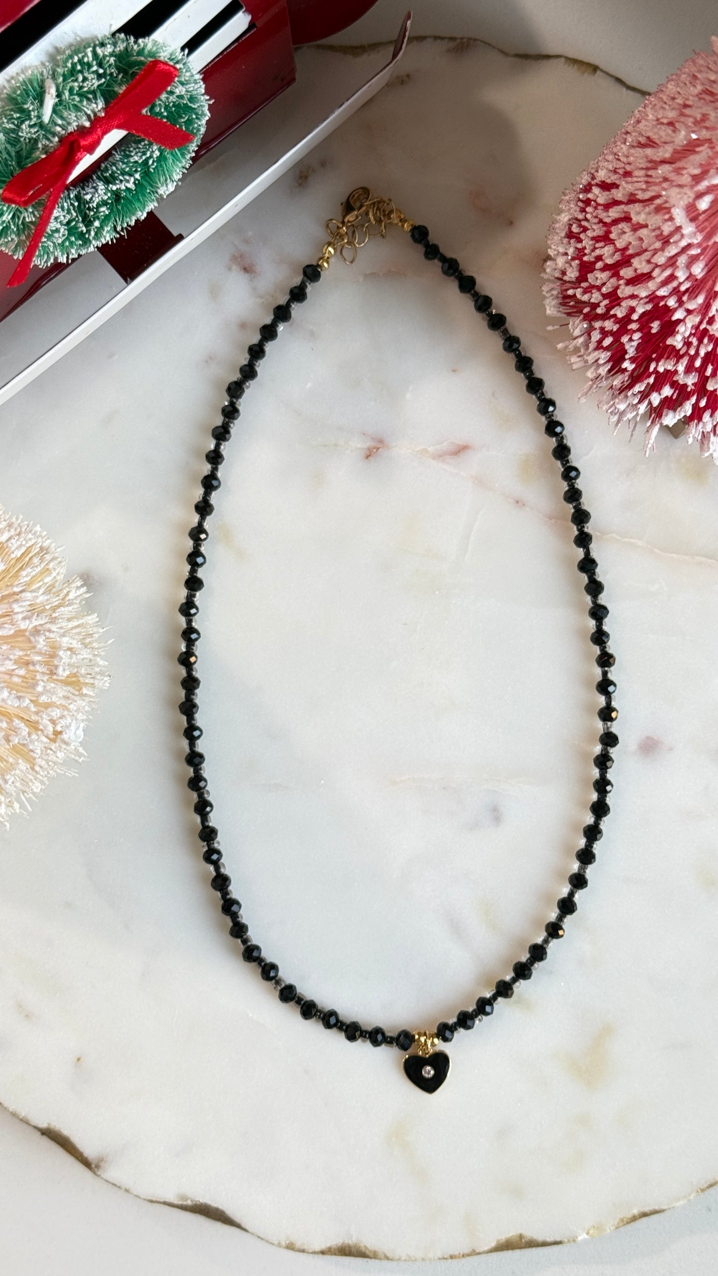 Collar Onix negro con corazón y con estrellas