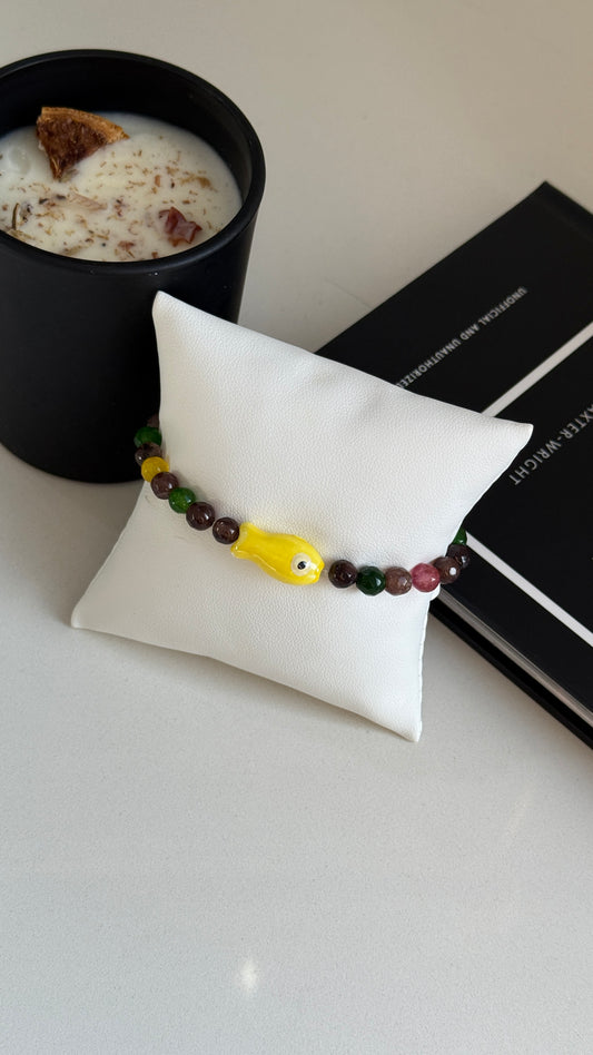 Pulsera oscura con Pez color c/u